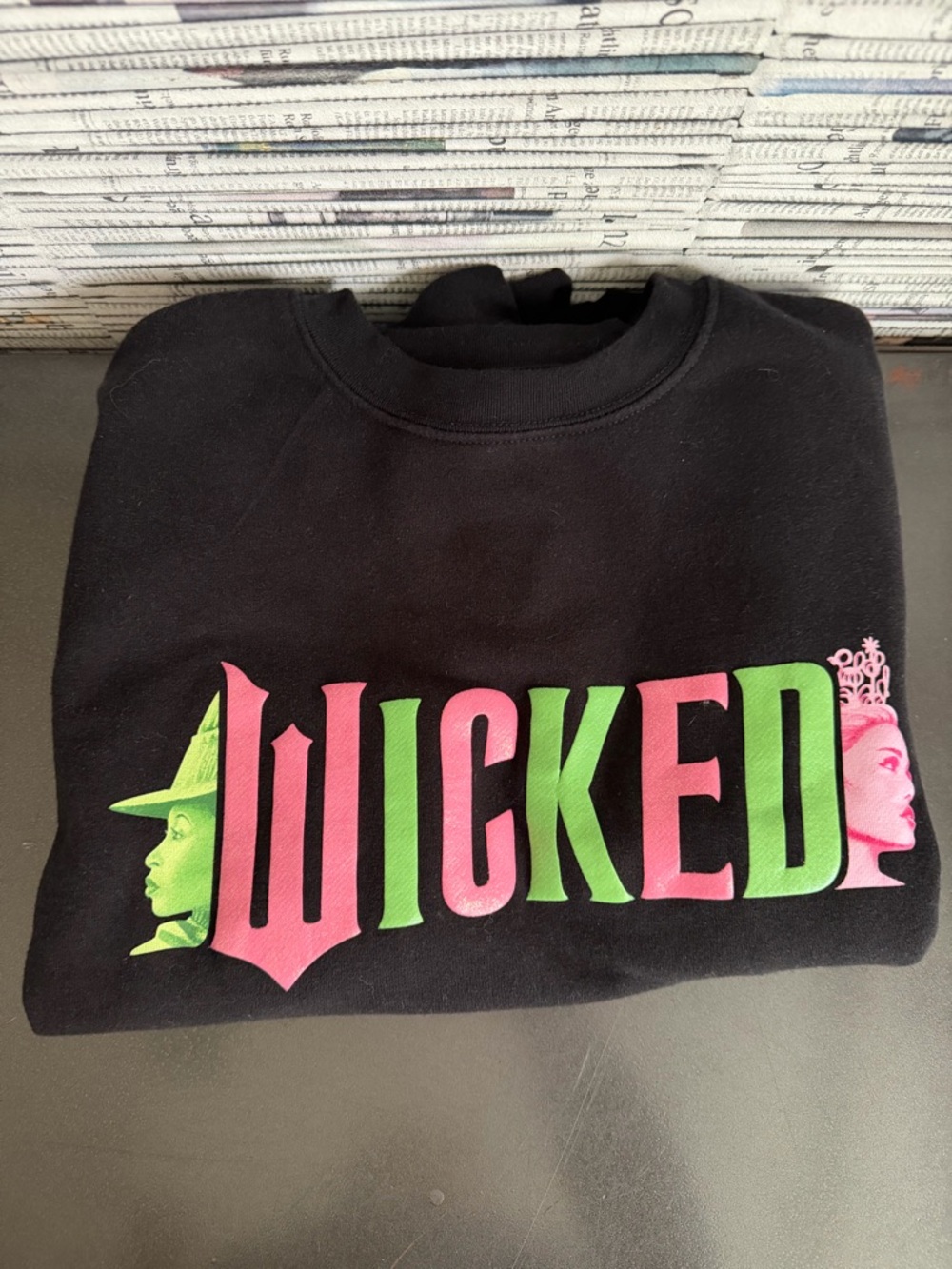 Universal Wicked Black Crewneck Sweatshirt with Pink and Green Graphic